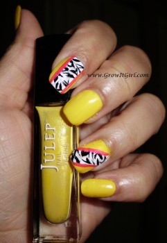 A zebra nail designs for my MANICure Monday feature. Using Yellow, black, white, and pink nail polish to achieve the look. www.growitgirl.com